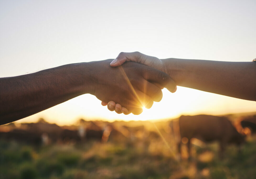 Welcome, handshake and people with b2b farm deal for agriculture, partnership or small business support. Thank you, shaking hands and farming collaboration for supply chain, trust and agro startup