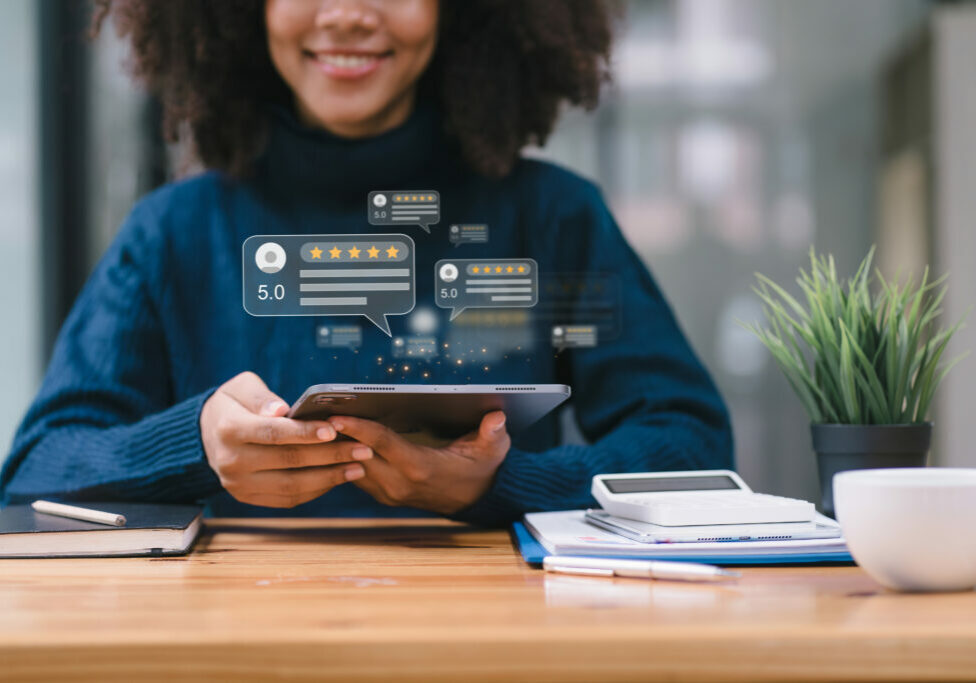 African American customer providing five satisfaction ratings. Customer service evaluation concept